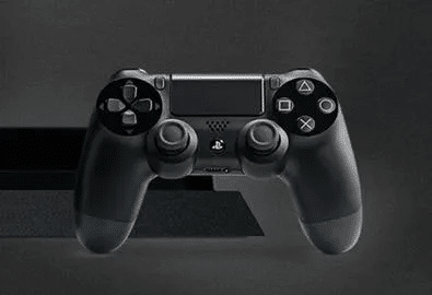 Black PlayStation 4 controller on a console. ER4Gadgets